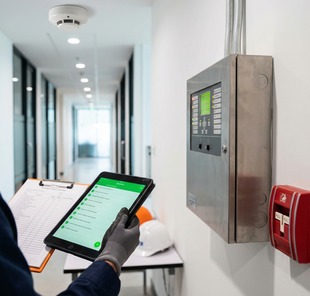 Close-up of compliant fire alarm system components