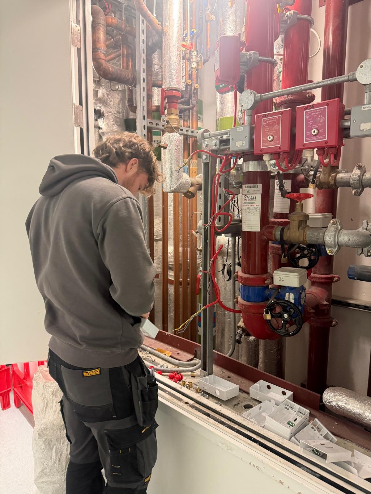 Sprinkler system control set and engineers on site